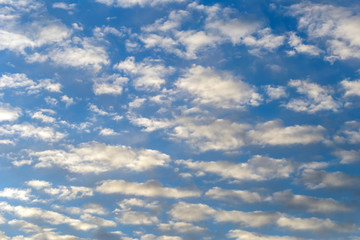 Blue sky covered with clouds.