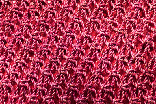 The pattern of red braided rope.
