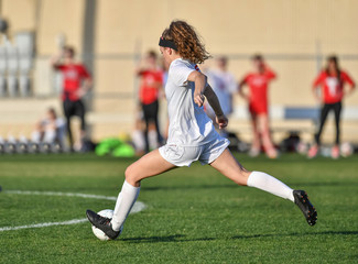Young soccer player in action © Joe