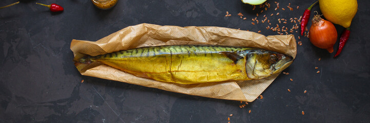 mackerel smoked fish and other ingredients. food background. copy space