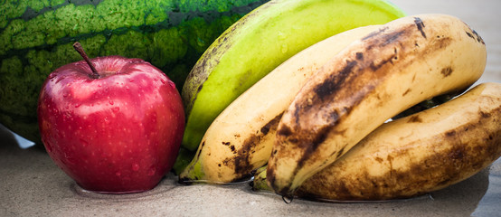 Exotic and colorful tropical fresh fruit mix on the beach