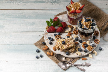 Healthy, juicy breakfast of yogurt with berries and mint