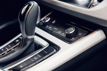 Obraz na płótnie Canvas Air conditioning button inside a car. Climate control unit in the new car. Modern car interior details. Car detailing. Selective focus