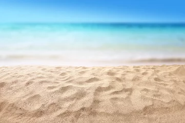 Foto op Plexiglas prachtig zandstrand met wazig oceaan achtergrond zomer concept © OHishi_Foto