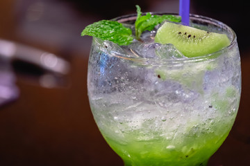 Green kiwi Italian Soda Cold Beverage and Kiwi Fruit and mint leave