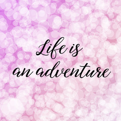 Life is an adventure. Calligraphy saying. Bokeh background. Quote for Social media post