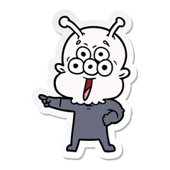 sticker of a happy cartoon alien pointing