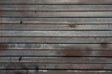 Surface of steel grey and brown garage