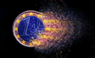 one euro coin explosion isolated close up