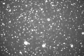 an abstract black and white falling rain drops texture background