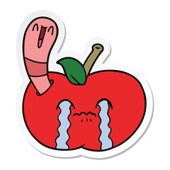 sticker of a cartoon worm eating an apple
