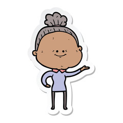sticker of a cartoon happy old woman