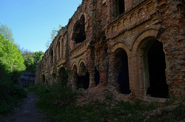 Old red brick walls in ruined defensive fort