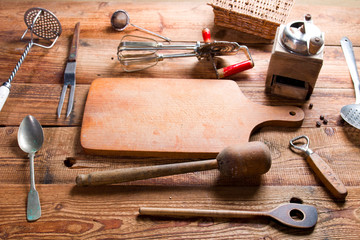 Kitchen equipment on wood.