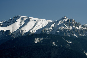 Fototapeta na wymiar Mountains with snow in the spring
