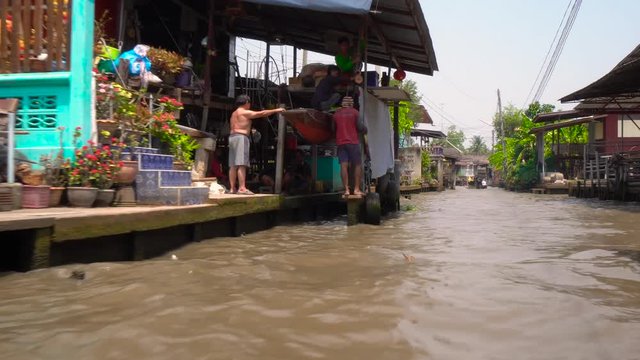 Bangkok Thailand Way To Floating Market Internal View Traditional Wooden Boats On River Canal POV