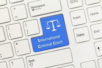 White conceptual keyboard - International Criminal Court (blue key with scales symbol)