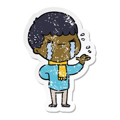 distressed sticker of a cartoon man crying