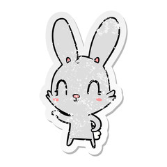 distressed sticker of a cute cartoon rabbit