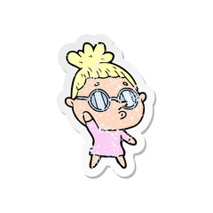 distressed sticker of a cartoon woman wearing glasses