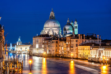 Fototapeta na wymiar Night shot of Grand Canal and Basilica Santa Maria della Salute, Venice, Italy.