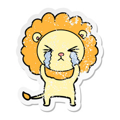 distressed sticker of a cartoon crying lion