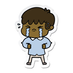sticker of a crying boy cartoon