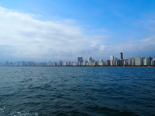Panoramic view on skyline of a big city from seaside in Santos, Brasil - Latin America 