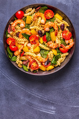 Fusili pasta salad with shrimps.