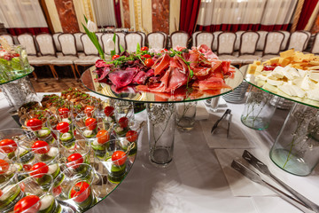 cold buffet  served by different canape, sandwiches, snacks .finger food. meat assorted 