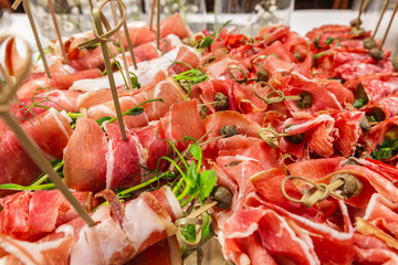 cold buffet  served by different canape, sandwiches, snacks .finger food. meat assorted 