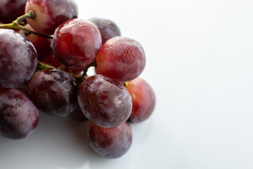 Bunch of red wet grapes