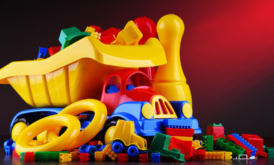 Composition with colorful plastic children toys