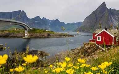 Papier peint photo Villes / Voyage fishing port and the mountains at the Reinefjord in Lofoten in Norway  © tmag