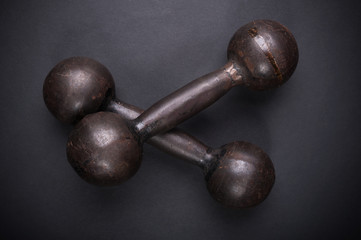 Older solid cast dumbbells