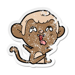 distressed sticker of a crazy cartoon monkey