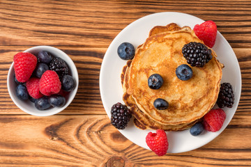 Top view of a Pancakes with berries