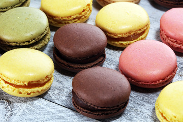 Sweet and colourful french macaroons or macaron on white background