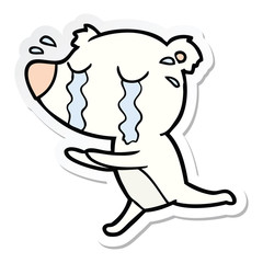 sticker of a cartoon crying polar bear