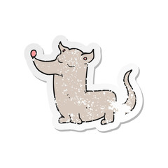 retro distressed sticker of a cartoon little dog
