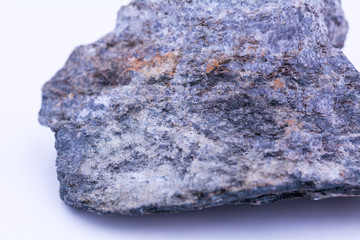 Fototapeta premium A natural stone with blue shades, dust, rust and dirt on the surface, macro, close up