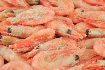 Frozen cooked prawns.