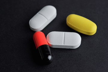 Tablets and capsule.