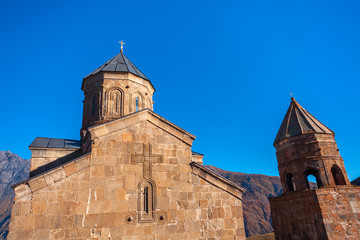 Fototapeta na wymiar Gergeti Trinity Church in the mountains of the Caucasus