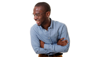 young african american businessman with glasses laughing with arms crossed against isolated white background