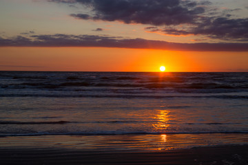Fototapeta na wymiar Sunrise at the Beach in the Gulf of Mexico, Texas