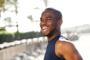Close up happy young black man outdoors