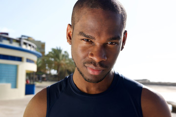 Close up cool young african american sports man with serious expression