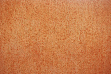 Texture of a smooth brown metal surface with drops and rust stains