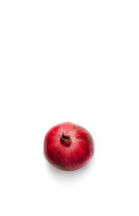 Top view of Fresh fruit pomegranate isolated on white. Red pomegranate fruit, tropical fruit. Pomegranate on white. Eating exotic fruits, calories and vitamins. Sweet fruits to eat.